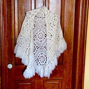 White crocheted shawl with fringes